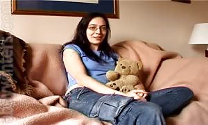 Gabrielle is leisurely undressing on the digital camera in the main bedroom