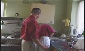 blond English beauty penetrated in the kitchen