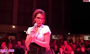 Nerdy-looking new comer stripper taking off her underwear on public