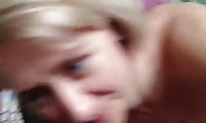 stylish short-haired blond is swallowing a humungous wiener